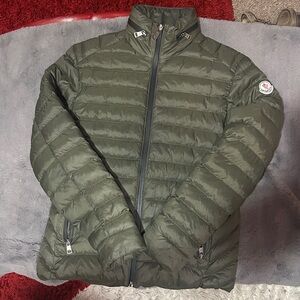 Moncler Olive Jacket down light weight.  Never worn in mint condition.  Size 2
